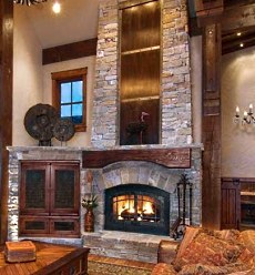 Custom stone fireplace hearth ideas come from a long and rich legacy of stone fireplace design . . . with no shortage of fresh and innovative ideas for new designs!