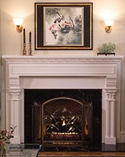 Beautifully finished wood fireplace mantels with rich exotic accents make a powerful design statement as they lend warmth and elegance to any room!