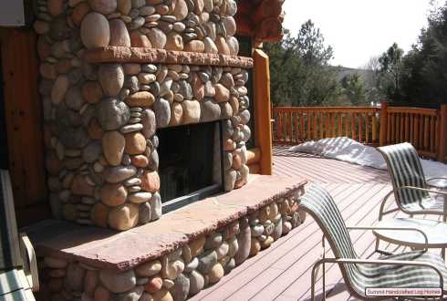 river rock fireplace surround