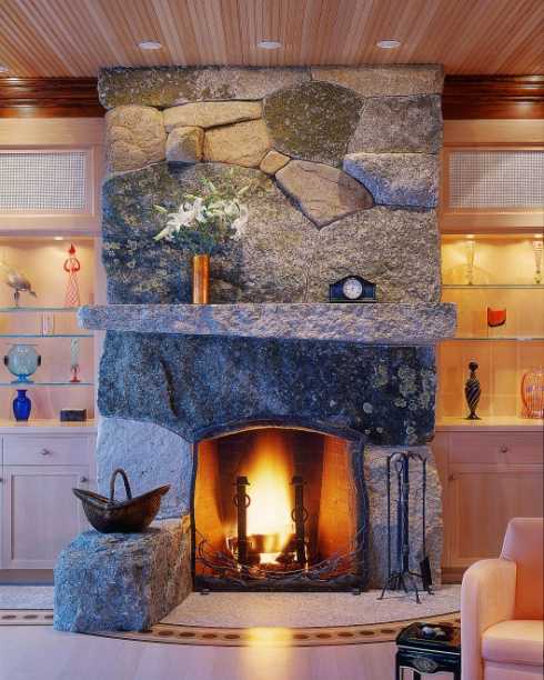 stone surround fireplace with built ins