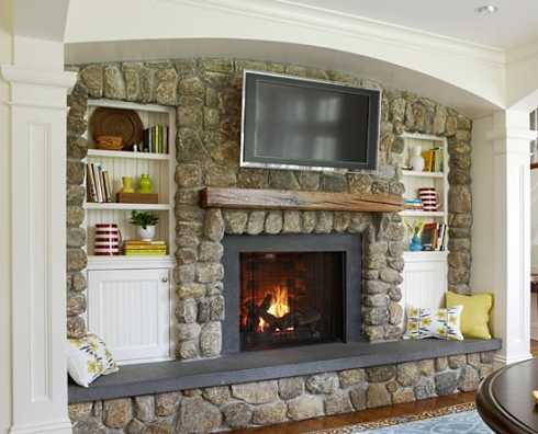 flat screen tv over fireplace