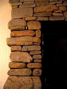 stacked stone fireplace