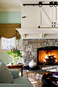 stone surround fireplace with built ins