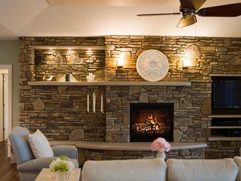 stone surround fireplace with built ins