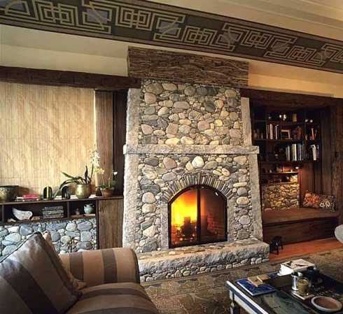 stone surround fireplace with built ins